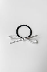 HAIR TIE WITH METALLIC BOW
