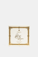 Santa Maria Novella packaging tablettes de cire Acqua della Regina boîte fermée dorée florale fond blanc