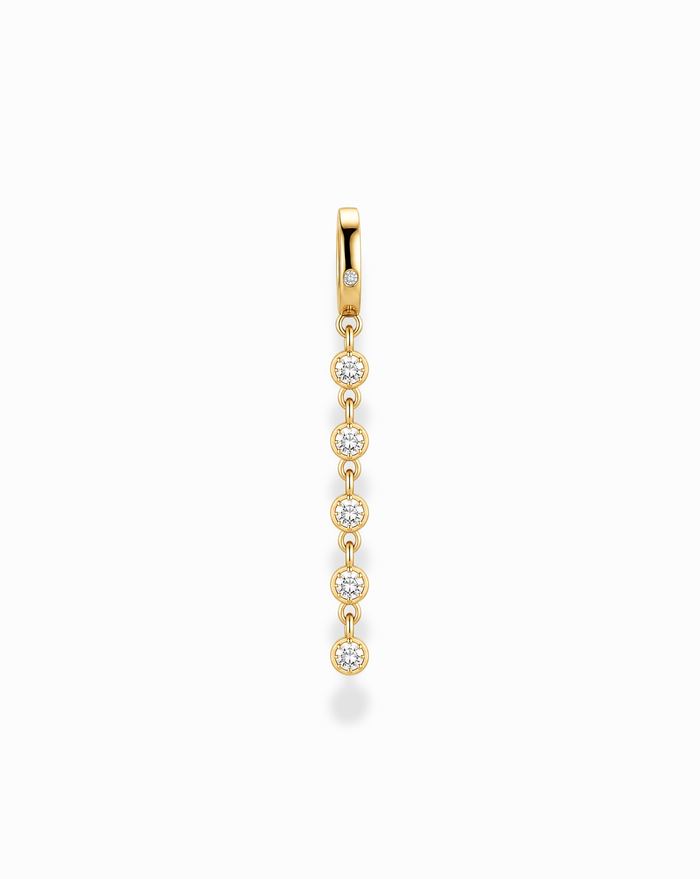 The Demi Tennis Charm by Mod + Jo features six round, vertically aligned cubic zirconia charms, each connected by delicate 14k gold-plated links, beautifully displayed on a white background.