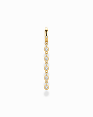 The Demi Tennis Charm by Mod + Jo features six round, vertically aligned cubic zirconia charms, each connected by delicate 14k gold-plated links, beautifully displayed on a white background.