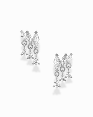 Introducing the Gabby Marquise Dangle Studs by Mod + Jo—a pair of silver earrings adorned with marquise-cut stones and dangling round crystals in a delicate, cascading design. These cubic zirconia earrings are elegantly showcased against a white background.