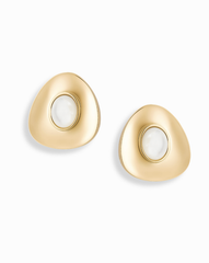 The Hunter Statement Studs by Mod + Jo are 14k gold, irregularly-shaped earrings with a white circular stone at the center, shown on a white background.