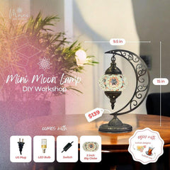 Decorative Mini Moon Lamp with mosaic globe on dark curved metal stand, sits on wooden table