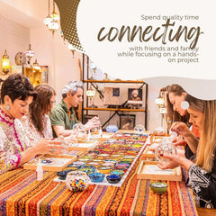 Group of adults creating mosaic art in a colorful workshop studio in Voorhees, NJ