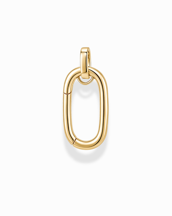 The Mod + Jo Pip Charm Enhancer is a 14k gold, oval-shaped pendant featuring a smooth, polished surface and a small loop at the top for attaching to a chain, displayed on a plain white background.
