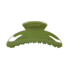 The Karst Essentials Slim Hair Claw Clip in olive is a glossy, curved accessory ideal for thicker hair, featuring "KARST" embossed on top and shown against a plain white background.