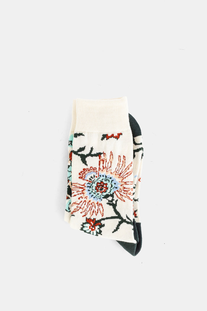 Sacai chaussettes femme coton blanc cassé motif floral passiflore rouge et bleu ciel replié en deux