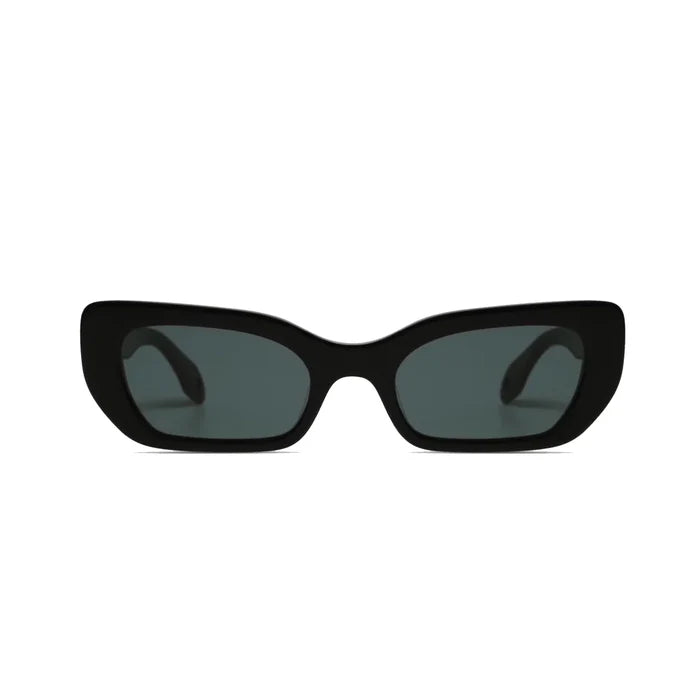 Cookie Sunglasses by Elisa Johnson: black, rectangular cat-eye shades with thick acetate frames and UV400 dark lenses, shown on a white background.