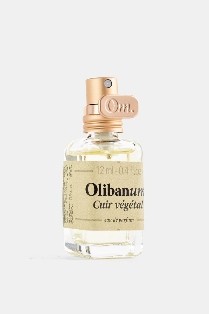Olibanum Cuir Végétal parfum femme flacon transparent étiquette beige bouchon rosé 12 ml eau de parfum