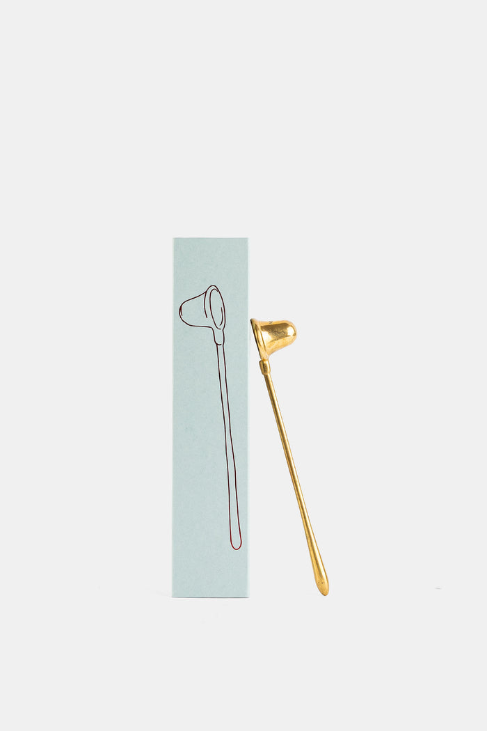 Trudon éteignoir cloche dorée présenté avec son packaging boîte bleu clair illustration gravée accessoire bougie