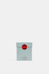 Trudon Gabriel boîte fermée avec sceau rond rouge sur emballage cartonné bleu céladon, packaging luxe