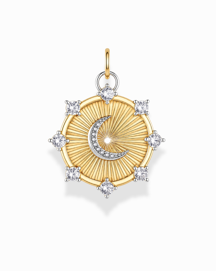 Discover celestial jewelry at its finest with the Lyra Moon Charm by Mod + Jo. This gold pendant features a radiant sunburst design, elegantly highlighted by a graceful moon charm and shimmering diamond accents. Eight sparkling diamonds adorn the edges, while a small loop at the top makes it easy to attach to your favorite chain.