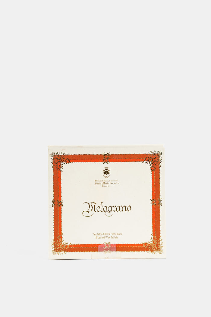 Santa Maria Novella packaging tablettes cire Melograno encadrement orange doré motifs floraux fond ivoire