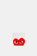 Comme des Garçons Parfums Play Red EDT packaging carré blanc cœur rouge yeux noirs dépassant en bas de boîte