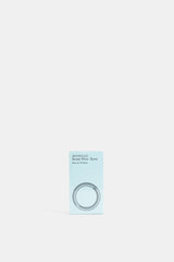 Comme des Garçons Parfums Scent Five Syros boîte rectangulaire bleu ciel logo cercle gravé fond neutre