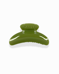 The SuperClip Hair Claw, in olive green and made from durable cellulose acetate with "KARST" embossed on top, is shown against a white background.