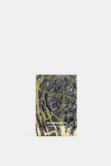 Comme des Garçons Parfums Wonderoud boîte packaging texture écorce noire et dorée fond épuré 100ml