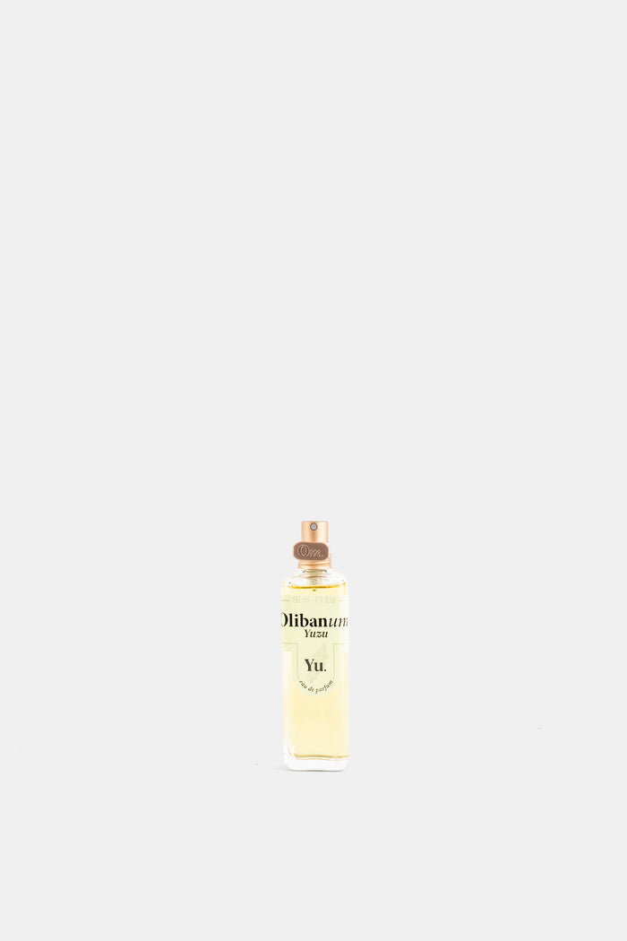 Olibanum Yuzu Yu. eau de parfum 50ml flacon verre transparent liquide doré spray pompe dorée rosé